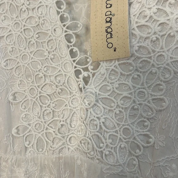 Rafaela D’Angelo. White boho or beach maxi dress.